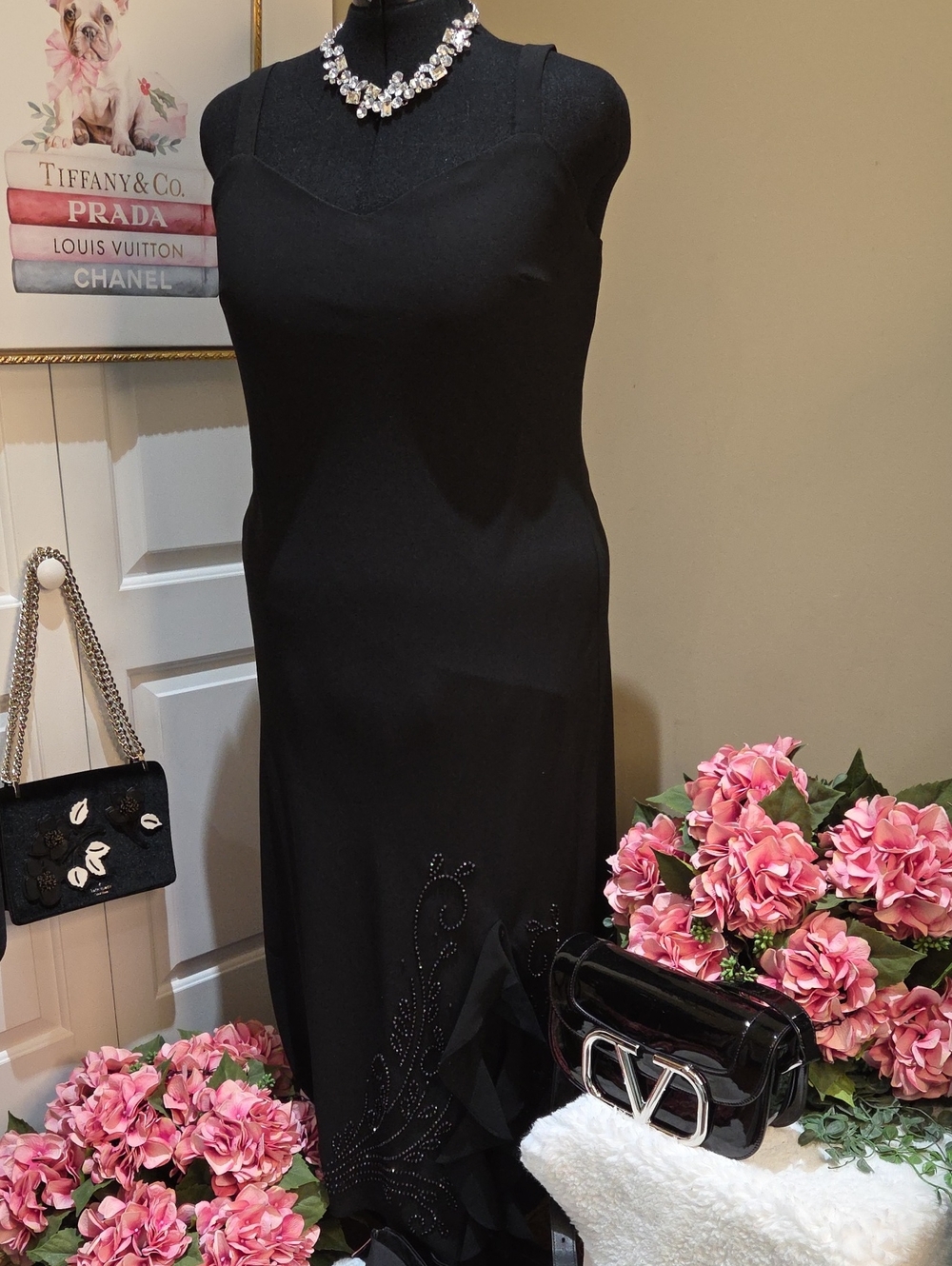 Elegant Black Sleeveless Maxi Dress with Subtle Embellishment
